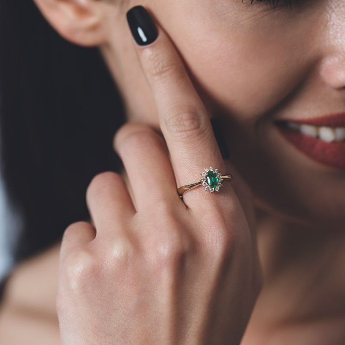 Women's rosette ring 18CT with emerald SDU0001